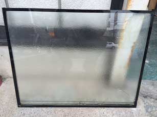 市川市の複層ペアガラス水たまり